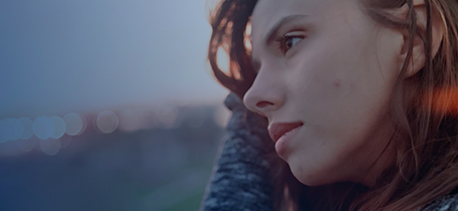 A woman with her hand in her head